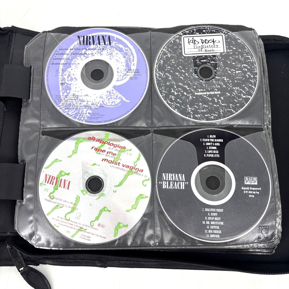 Lot Of 76 CDs Rock Music In Binder NIN, DMB, Nirvana, Incubus, Tribe Quest Y2K